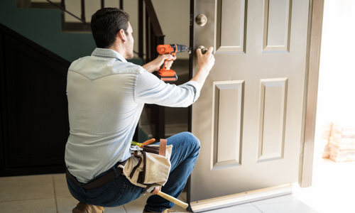 Man installing lock